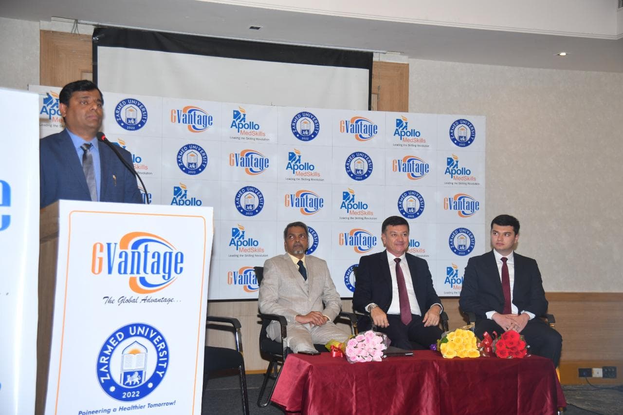 Press conference podium with GVantage and ZARMED University branding